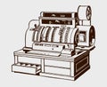 Antique cash register with open drawer in three-quarter front view