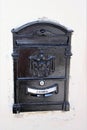 Valletta, Malta, July 2014. Antique cast iron mailbox on the wall of an old house.