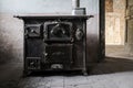 antique cast iron stove in old abandoned house Royalty Free Stock Photo