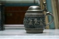 Antique ceramic beer tankard man table stillife Royalty Free Stock Photo