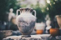Antique ceramic vase in a garden setting Royalty Free Stock Photo