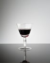 Antique chalice of red wine