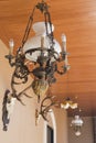 Antique chandelier on wood palate.