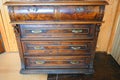 Antique chest of drawers in the interior of the house