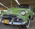 An antique chevrolet green car in boyaca colombia town