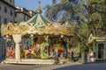 Antique children`s carousel in the historic center of Lucca, Tuscany, Italy