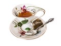 Antique China tea cup and saucer with teabag and silver spoon