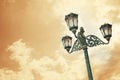 Antique city light over sunset sky Royalty Free Stock Photo