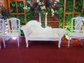 Antique classic white seats with decorative background