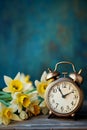 Antique clock with daffodils symbolizing daylight saving time transition and spring awakening. Vertical banner. Copy space Royalty Free Stock Photo