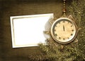 Antique clock face with lace and firtree