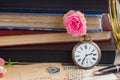 Antique clock with old books and letters Royalty Free Stock Photo
