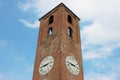 Antique Clock Tower on Blue Sky Background