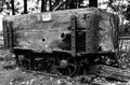 Antique coal cart in field