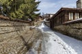 Antique cobblestone street with beauty ancient houses, town Koprivshtitsa