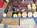Antique coins, medals and diplomas for sale in a flea market