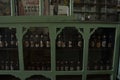 Antique colombian beer bottles into a store showcase