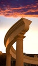 Antique colonnade on a background of the sunset sky Royalty Free Stock Photo