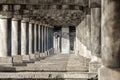 Antique colonnade. Stone pillars and stairs. Ancient colonnade