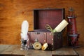 Antique compass, inkwell and old wooden chest on wooden table. black and white style old photo Royalty Free Stock Photo