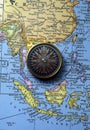 Antique compass on map (South East Asian Region) Royalty Free Stock Photo