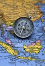 Antique compass on map (South East Asian Region) Royalty Free Stock Photo