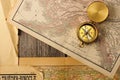 Antique compass over old map Royalty Free Stock Photo