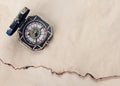 Antique compass over old paper background Royalty Free Stock Photo