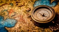 An antique compass placed on a vintage map Royalty Free Stock Photo