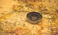 Antique compass on vintage africa travel map, exploration and navigation concept background photo