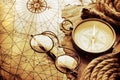 Antique compass on vintage map Royalty Free Stock Photo
