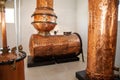 Antique copper containers for distilling fermented cane juice in the production of rum. Drinks, alcohol