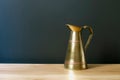 Antique Copper Jar On Wooden Surface In Black Walls Interior