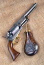 Antique Cowboy Pistol and Gunpowder Flask Royalty Free Stock Photo