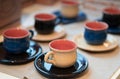 Antique cups with blurred background