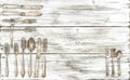 Antique cutlery rustic wooden background kitchen utensils Royalty Free Stock Photo