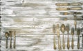 Antique cutlery rustic wooden background kitchen utensils vintage Royalty Free Stock Photo