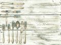 Antique cutlery wooden background kitchen utensils vintage Royalty Free Stock Photo