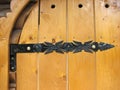 Antique decorated rivet on wooden door