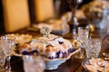 Antique dishes on a laid table at Scotney castle