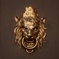 Antique door handle in the form of a lion