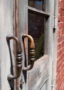 Antique door handles on glass pane doors