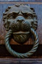 Antique door knocker with lion head Royalty Free Stock Photo