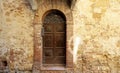 Antique door in Pienza, Tuscany, Italy Royalty Free Stock Photo