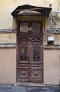 Antique door surrounded with wires