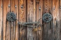 The Antique doorknob and the lock on the chain Royalty Free Stock Photo