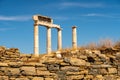 Antique doric columns and ruins on DELOS Island - mythological, historical, and archaeological site in Greece during sunny day Royalty Free Stock Photo