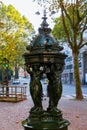 Antique drinking fountain in Paris Royalty Free Stock Photo