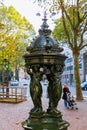 Antique drinking fountain in Paris Royalty Free Stock Photo