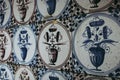 Antique Dutch Flower Pot Tile Delft Blue. Tiles behind fireplace Royalty Free Stock Photo